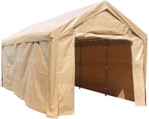 A spacious beige portable garage tent with a peaked roof, shielding a parked SUV from rain and sunlight in a suburban backyard surrounded by greenery.
