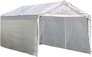 A durable white portable garage tent with a peaked roof and open front, housing a parked SUV on a grassy area beside a paved driveway. Ideal for protecting vehicles from the elements.