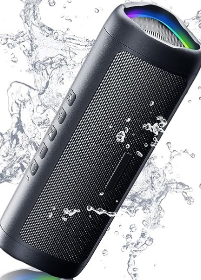 A cylindrical portable speaker with water splashing around it, indicating that the speaker is waterproof. The speaker has a textured surface, buttons on the side for power, volume, and play/pause, and a colorful LED light visible through the top mesh grille.