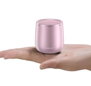 A small, cylindrical, pink device with the brand name 