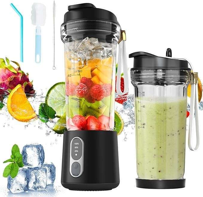 A portable blender set with a black base and a container filled with ice and fruits like mango, raspberries, and kiwi. Next to it is another container with a green smoothie. Accessories include a blue straw and two cleaning brushes, with water splashes, ice cubes, and fruit slices in the background.